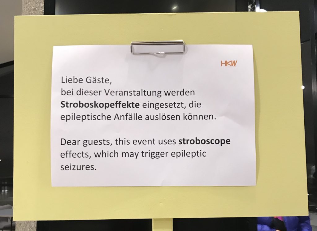 A post in the lobby read, 'this event uses stroboscope effects', HKW, 2018.11.23 // Photo by writer